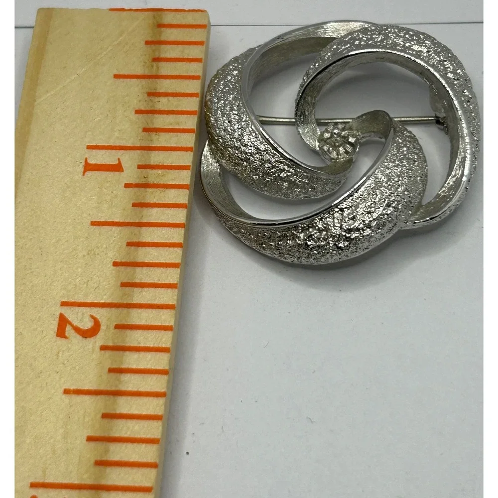 Vintage Monet‎ Swirl Brooch Silver Tone Textured Knot Twist Pin Classic Timeless